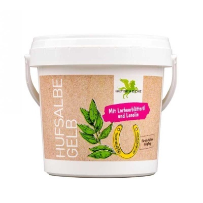 Frasco branco com etiqueta castanha com plantas e ferradura amarela