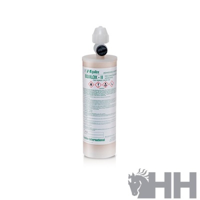 Frasco cilíndrico branco com tampa e etiqueta com texto verde e preto