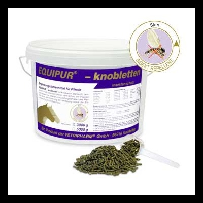 Pote branco com pelotas verdes EQUIPUR para cavalos com rótulo em alemão.