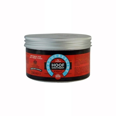 Pomada para cascos em embalagem preta com tampa prateada e rótulo vermelho e azul