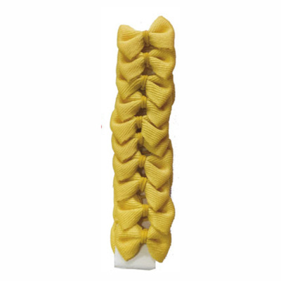 Ganchos de cabelo com laços amarelos e elástico branco