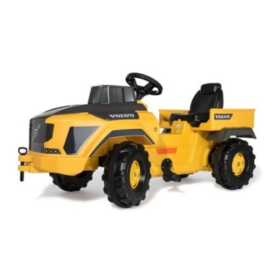 Trator infantil amarelo e preto da marca VOLVO em fundo branco