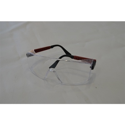 Óculos de proteção com lentes transparentes e armação preta com detalhes vermelhos