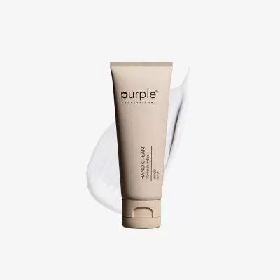 Tubo bege de creme de mãos Purple Professional com textura de creme branca ao fundo
