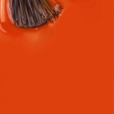 Pincel com tinta laranja brilhante