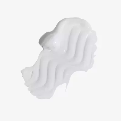 Amostra de creme branco ondulado em fundo branco