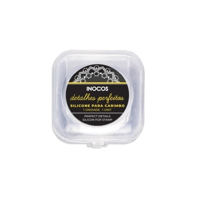 Embalagem plástica transparente com silicone para carimbo Inocos e etiqueta preta com texto em amarelo e branco
