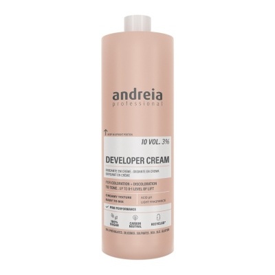Frasco de plástico rosa bege de creme desenvolvedor de cabelo marca andreia professional com tampa branca.