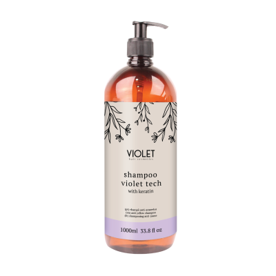 Frasco de shampoo com tampa de bomba, rótulo bege e padrão de folhas.
