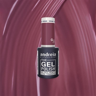 Frasco de verniz gel Andreia profissional cor bordeaux sobre fundo texturizado bordeaux.