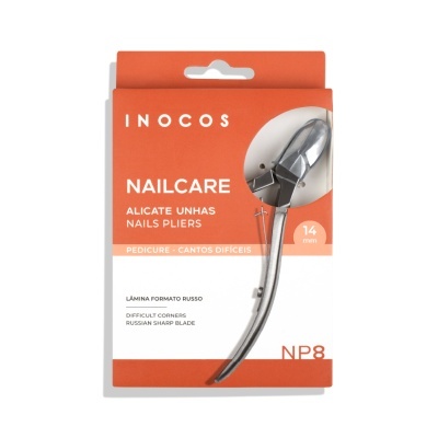 Alicate de unhas metálico em embalagem branca e laranja com texto INOCOS NAILCARE e detalhes do produto.