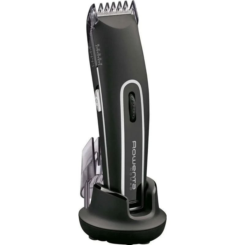 Aparelho de cortar cabelo elétrico preto e cinza num suporte de carregamento