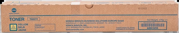Caixa de toner Konica Minolta TN221Y amarelo em papelão castanho com texto azul