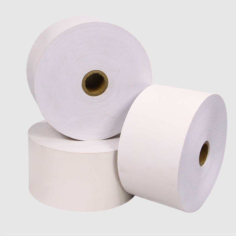Rolos grandes de papel térmico branco com núcleo de cartão castanho