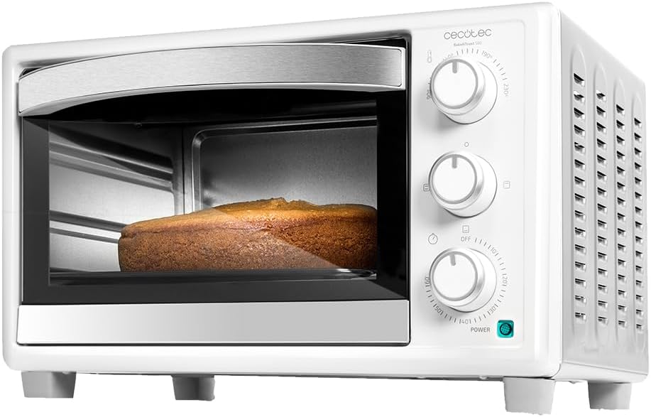 Forno elétrico branco com bolo dentro e botões de controlo