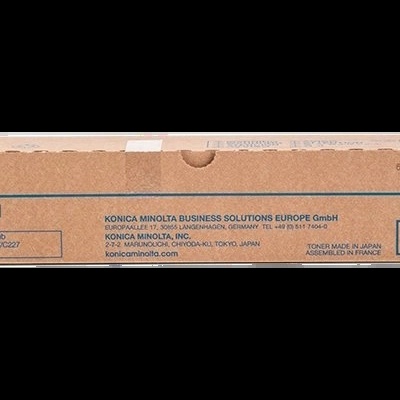 Caixa de toner Konica Minolta TN221Y amarelo em papelão castanho com texto azul