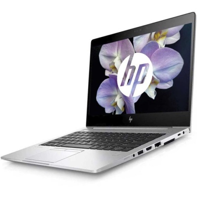 Portátil HP metálico cinza com teclado preto e ecrã com logótipo HP