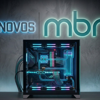 Computador de secretária iluminado com tubos de refrigeração e texto na parede