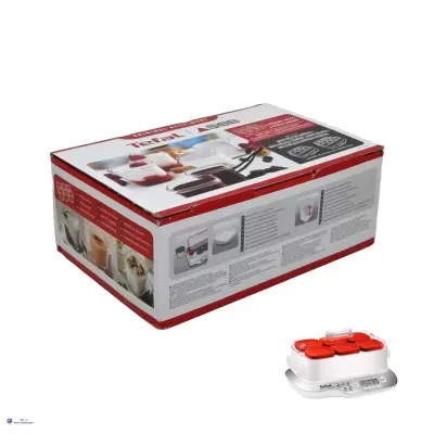 Caixa e aparelho de cozinha branco com tampas vermelhas