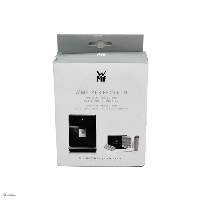 Conjunto limpeza WMF Perfection para máquina de café automática, embalagem branca com imagem e texto.