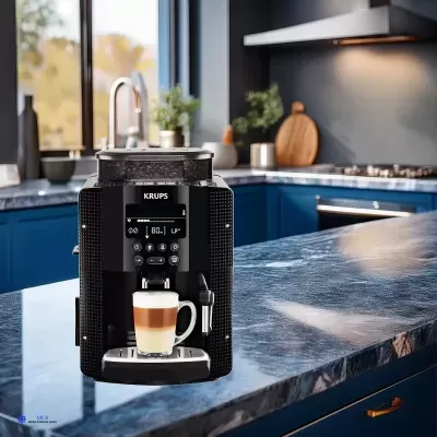 Máquina de café KRUPS preta com copo de café em bancada azul numa cozinha moderna