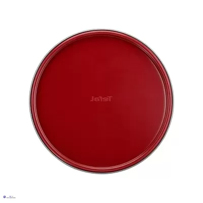 Tampa metálica vermelha circular com inscrição Tefal ao centro