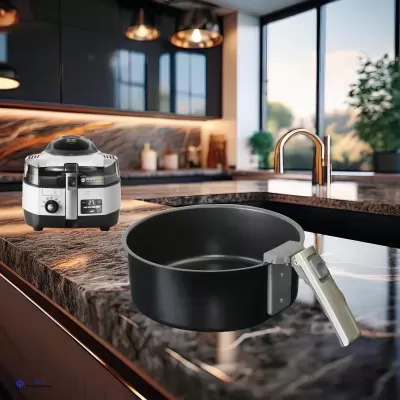 Panela preta e panela elétrica na bancada de cozinha moderna.