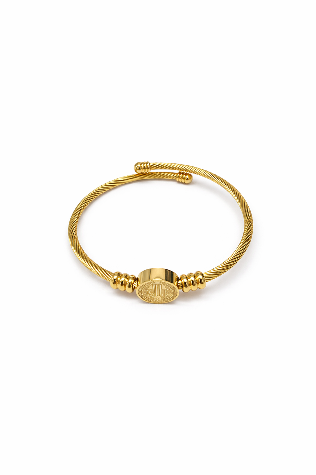 Pulseira dourada em design espiral com pendente redondo decorado