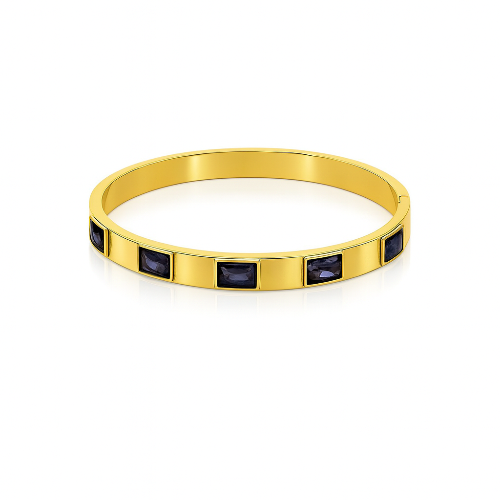 Pulseira rígida dourada com pedras negras embutidas