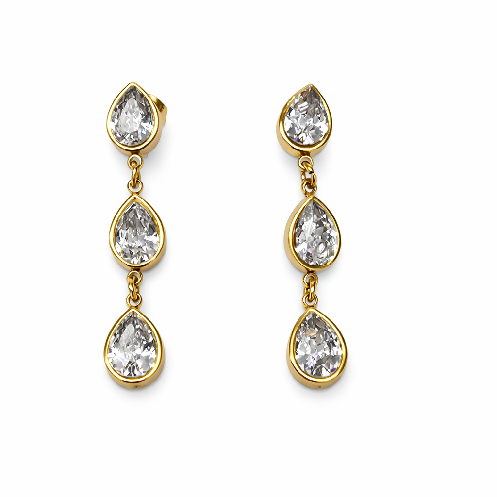 Brincos pendentes dourados com pedras transparentes em forma de gota