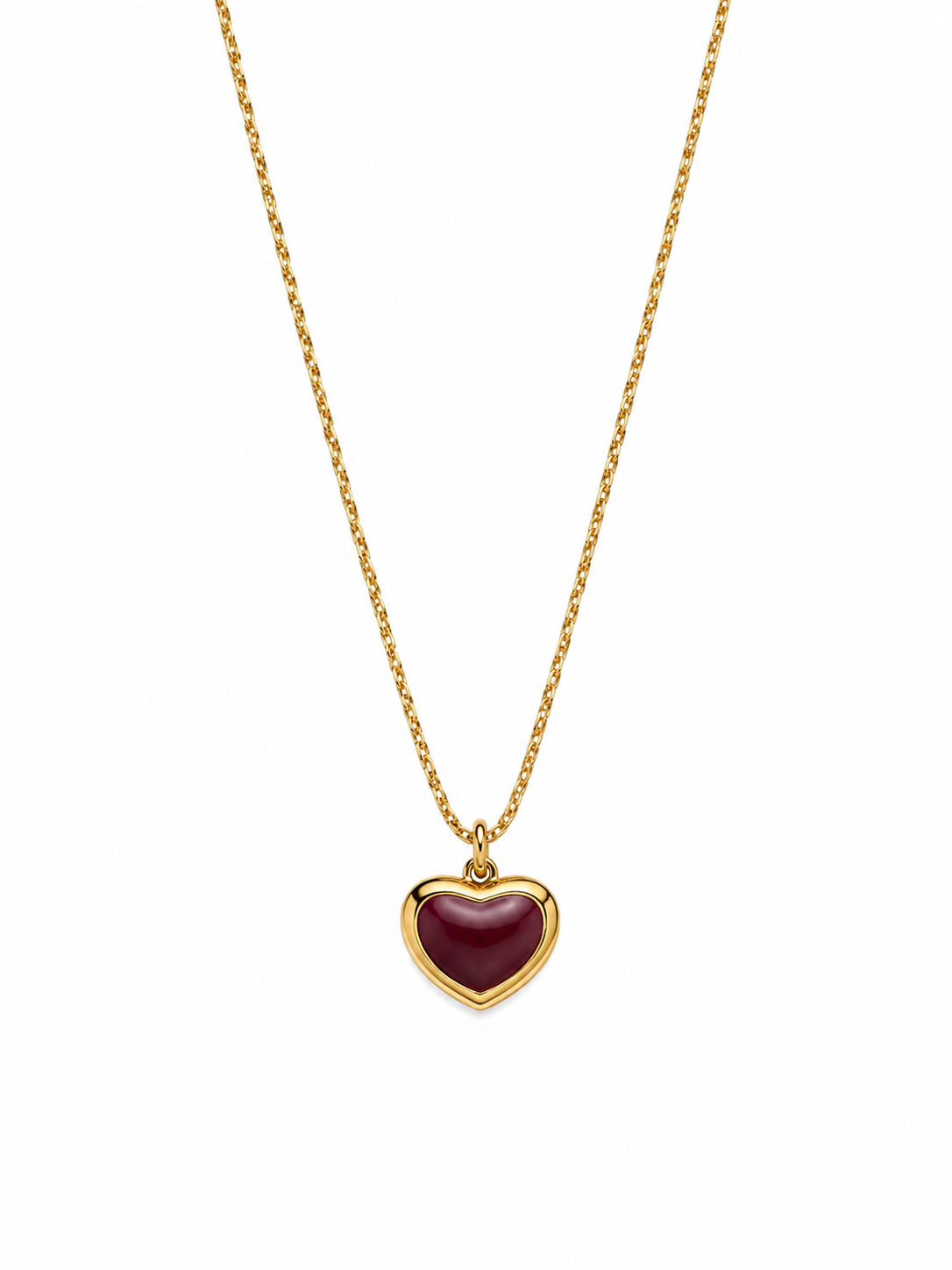 Colar dourado com pendente de coração vermelho
