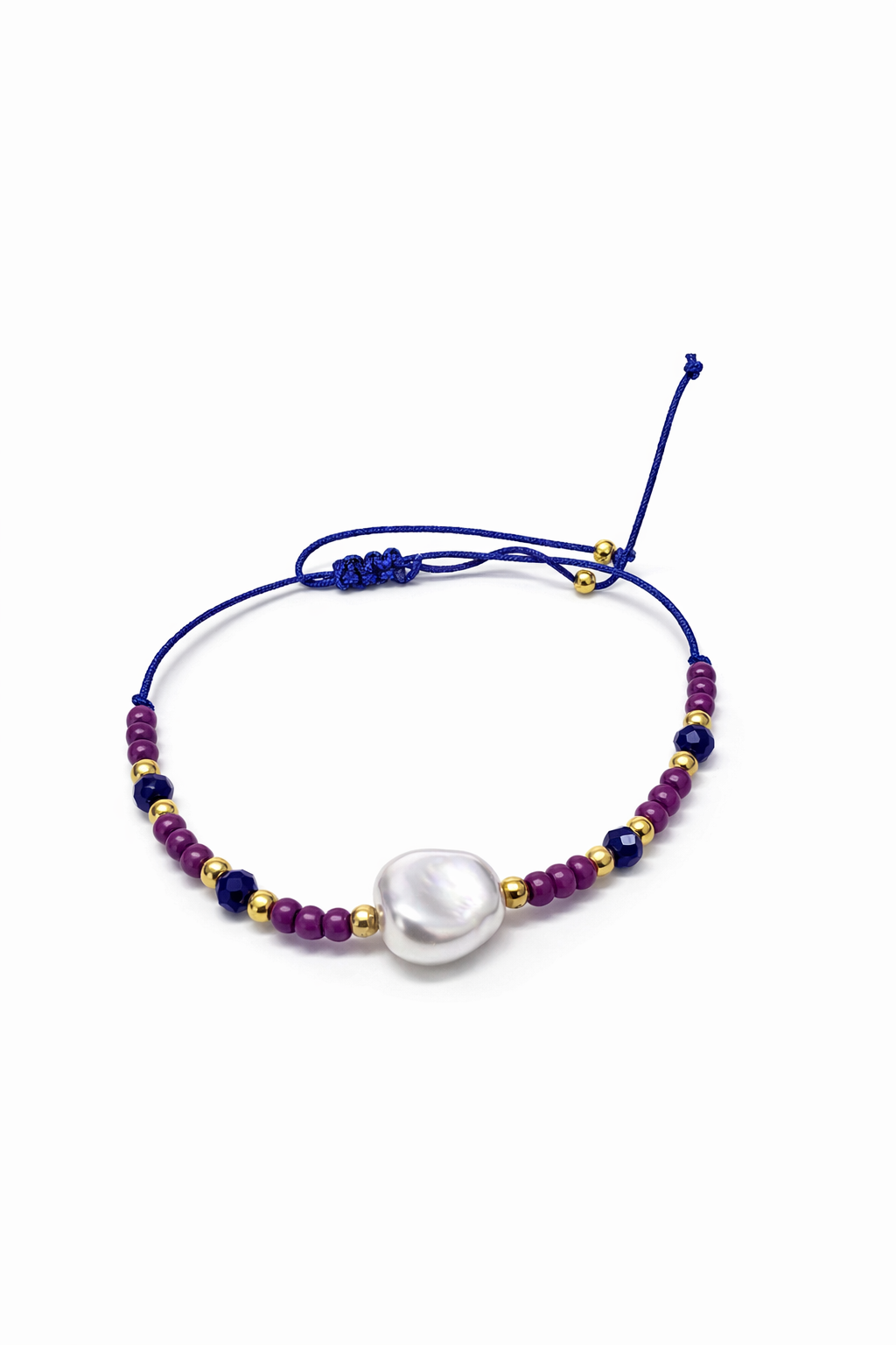 Pulseira ajustável azul com miçangas roxas, azuis, douradas e pérola central