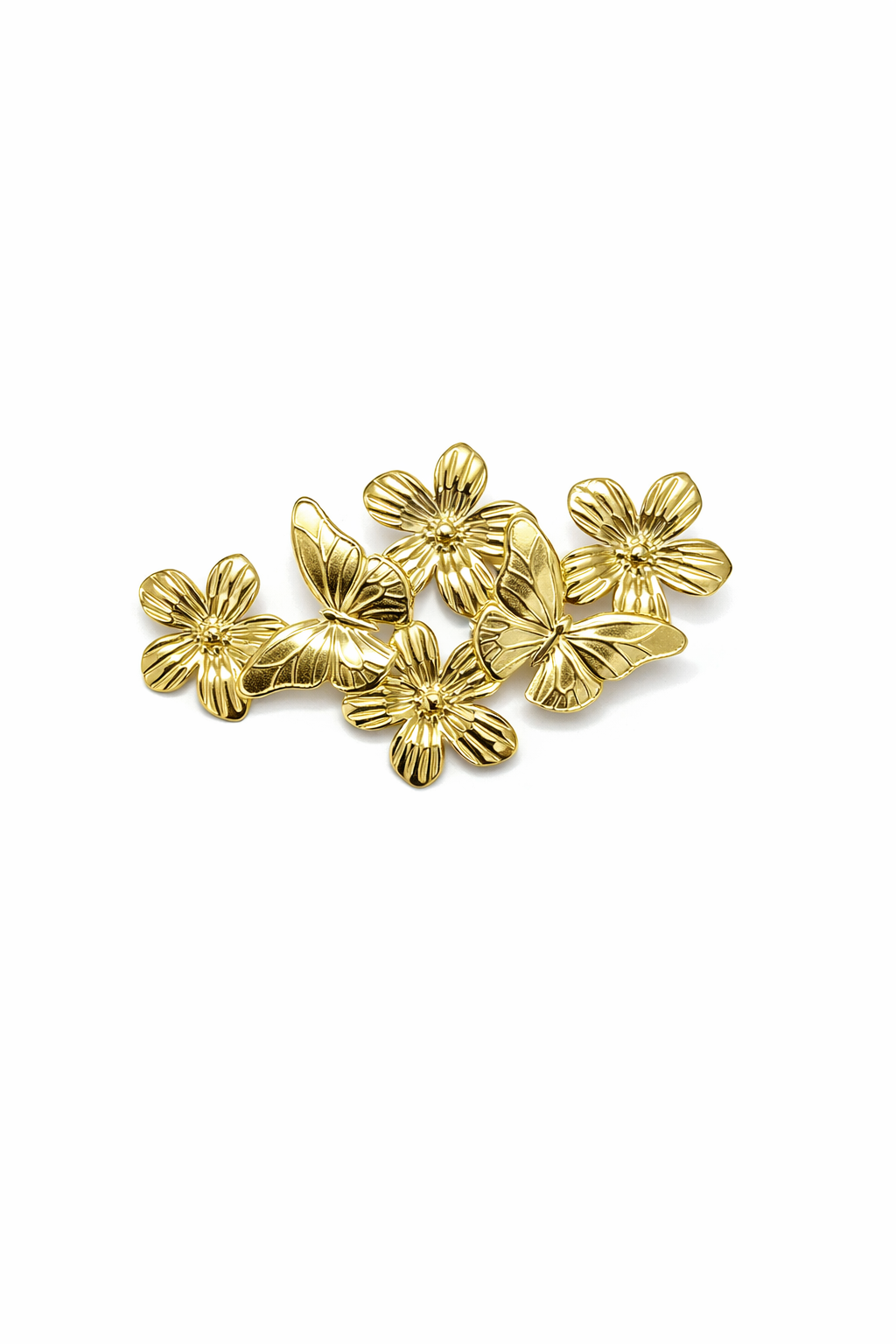 Acessórios dourados em forma de flores e borboletas com detalhes texturizados