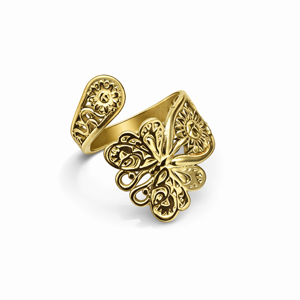 Anel dourado com borboleta e padrões florais