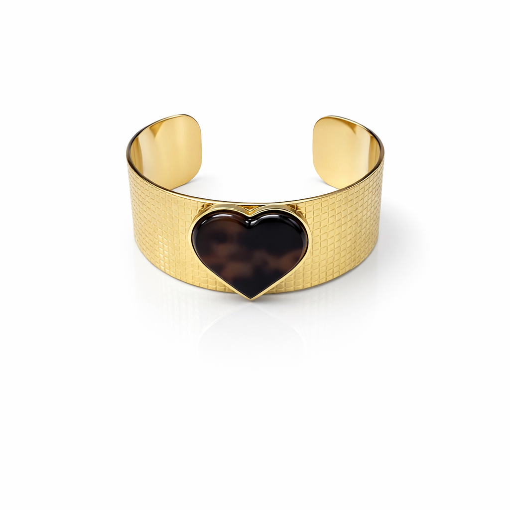 Pulseira dourada com coração castanho escuro e textura de linhas cruzadas