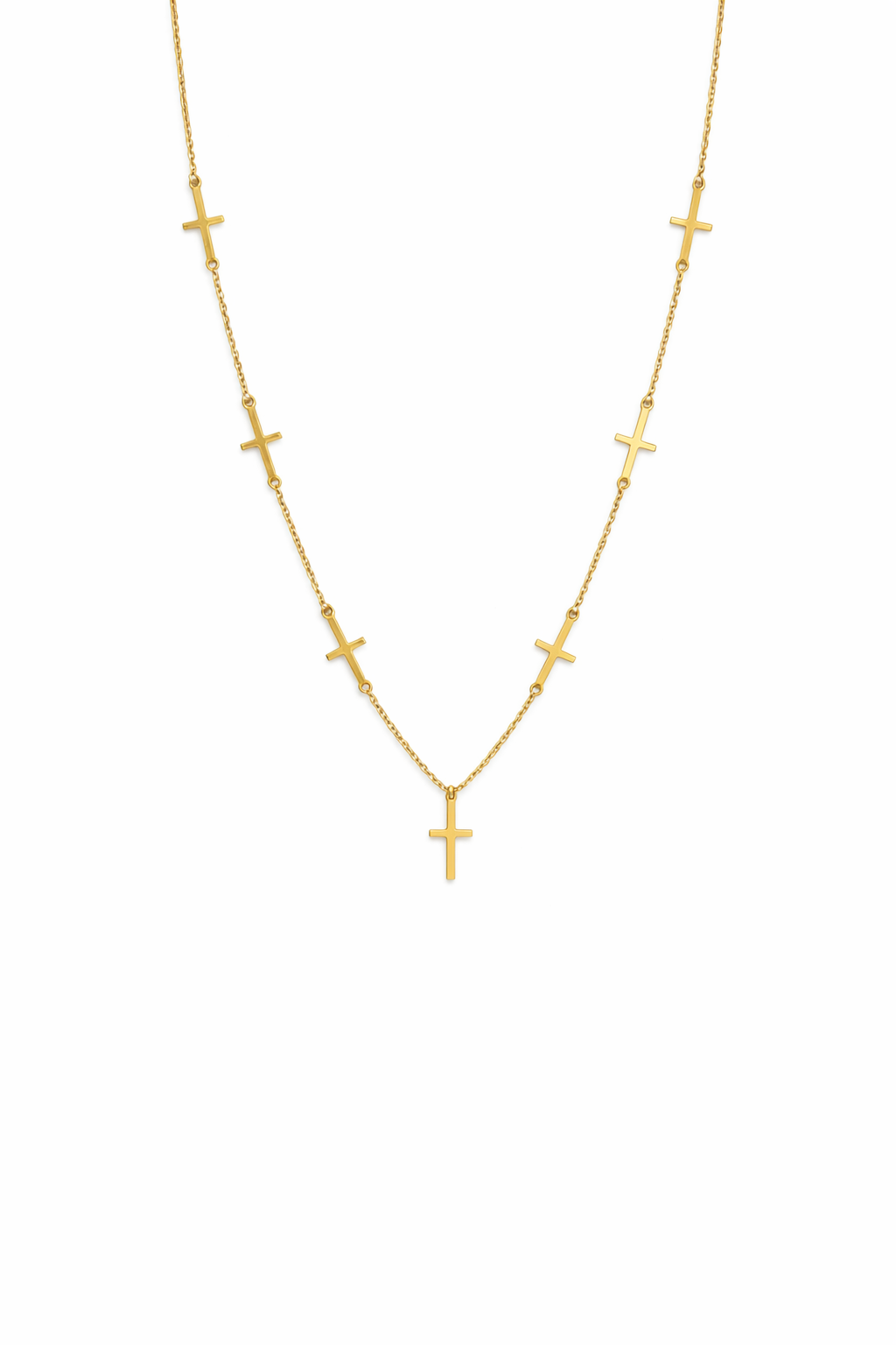 Colar dourado com várias cruzes espaçadas numa corrente fina