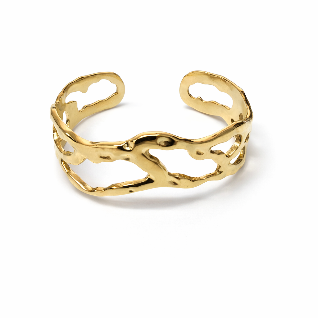 Pulseira aberta dourada com recortes irregulares