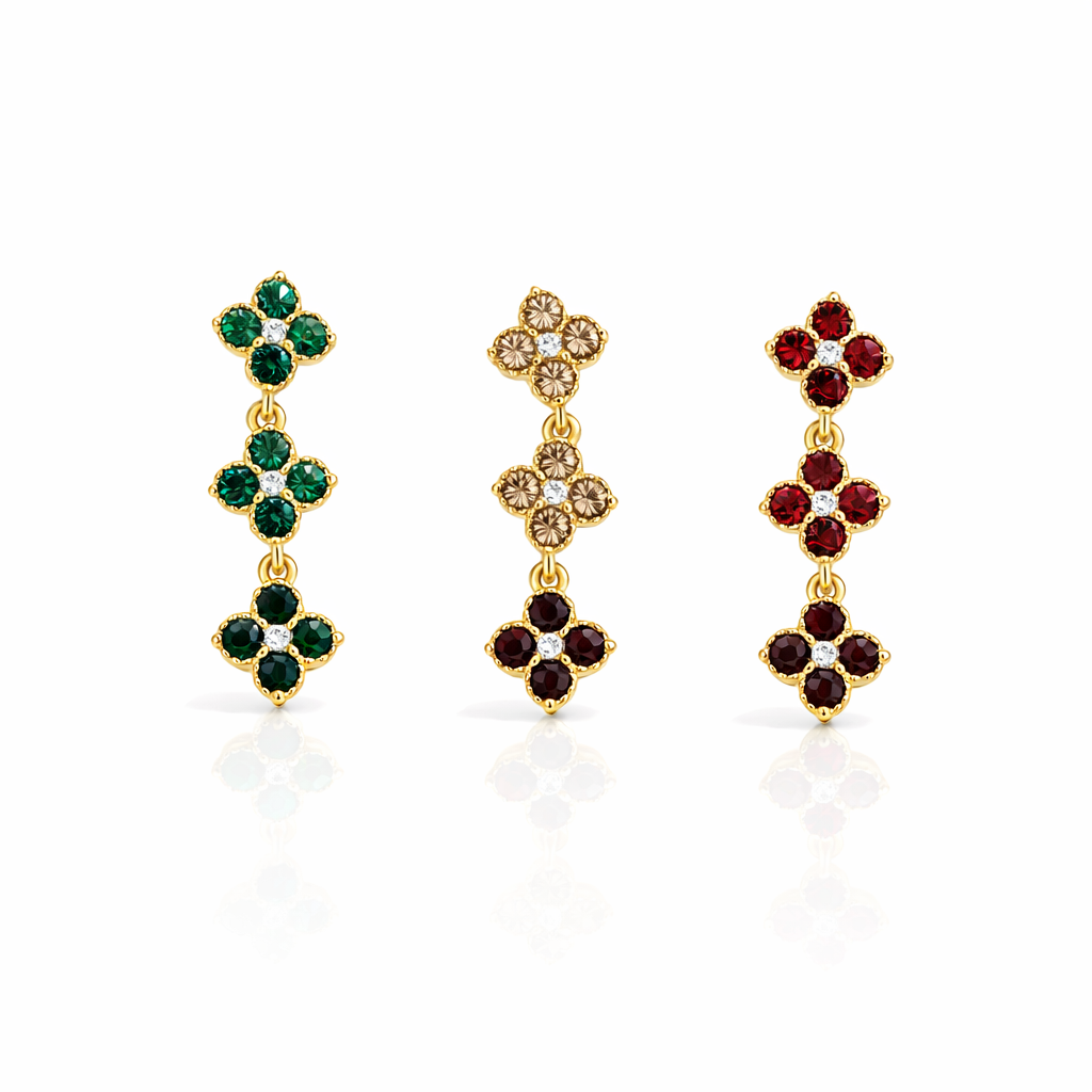 Três pares de brincos coloridos com pedras e detalhes em ouro