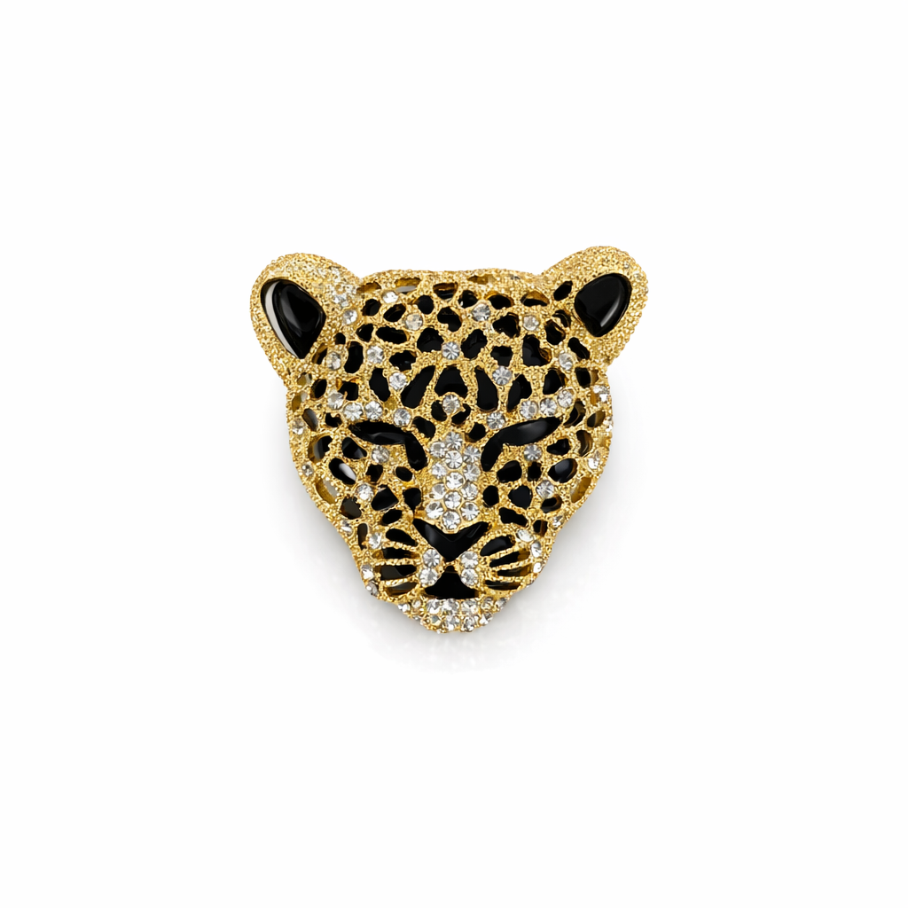 Broche pantera dourado com detalhes pretos e cristais