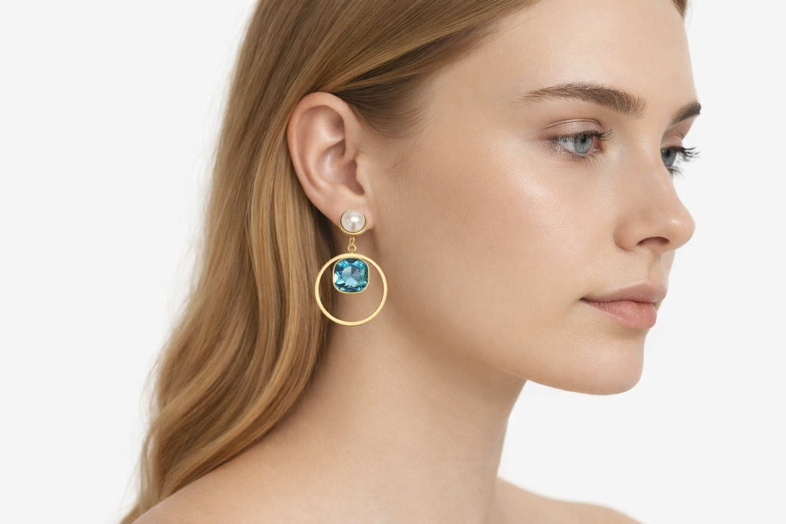 Brincos dourados com pérola e pedra azul