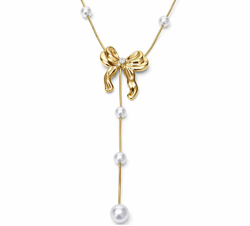 Colar dourado com laço e pérolas