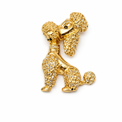 Broche dourado de cão poodle com strass
