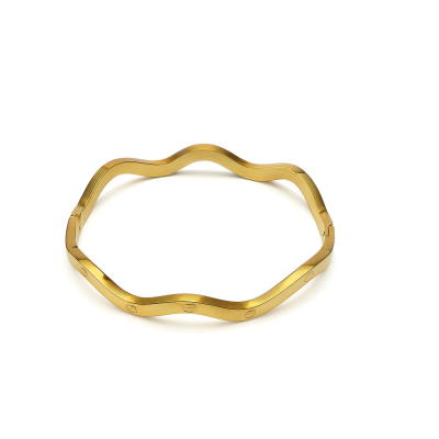 pulseira dourada de metal ondulada rígida