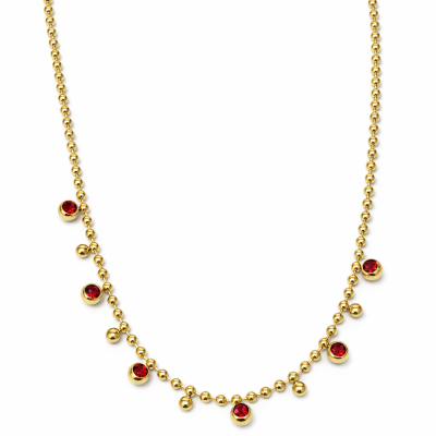 Colar dourado com pendentes vermelhos e dourados