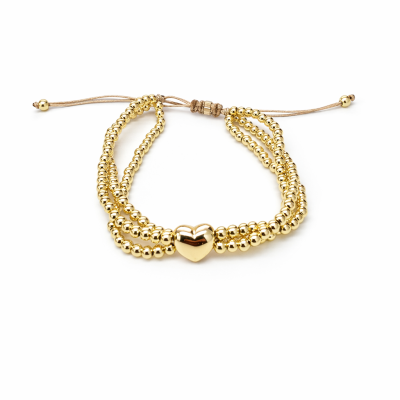 Pulseira dourada com contas pequenas e coração central