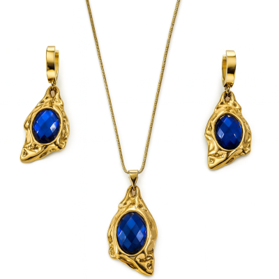 Colar e brincos dourados com pedras azuis ovais facetadas