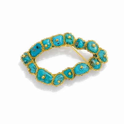 Broche oval com pedras turquesa e detalhes dourados