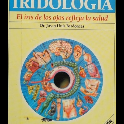 Capa do livro El Gran Libro de la Iridología com ilustração do iris colorido e texto em espanhol