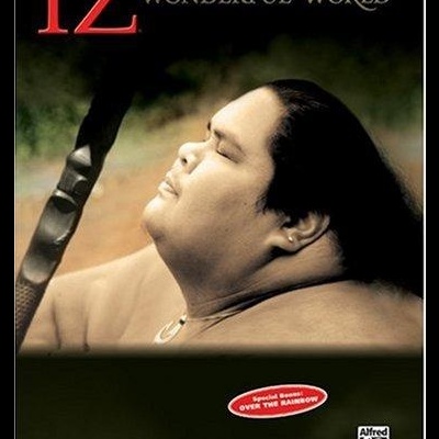 Capa de livro musical IZ WONDERFUL WORLD com foto de homem perfil e textos em vermelho e dourado