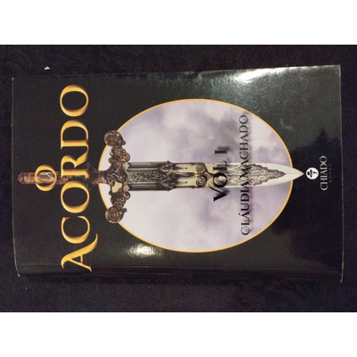 Capa de livro preto com título Acordo Vol. II e imagem de espada decorativa